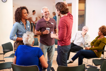 three students talking