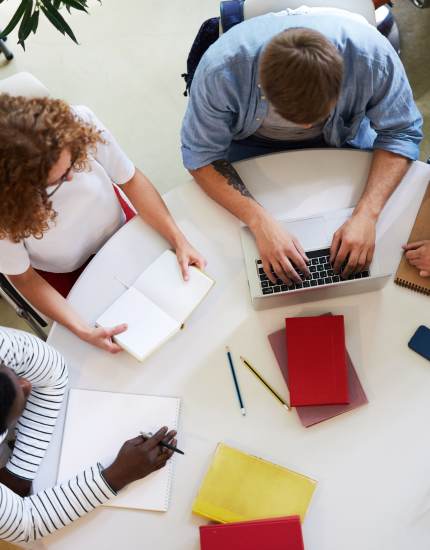 people working at a desk