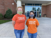 volunteers in food bank t-shirts