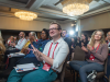 Compact25 attendees applauding